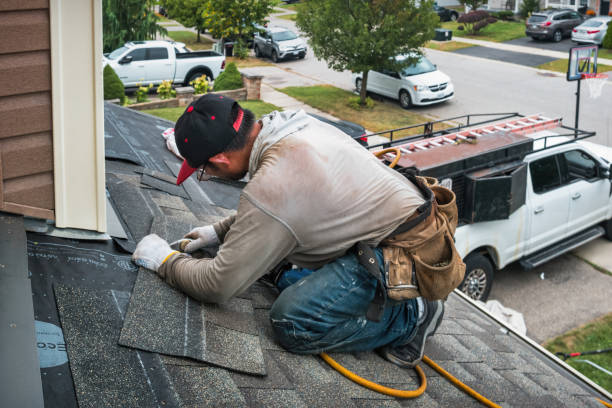 Professional Roof Replacement technician working in Parlin, NJ